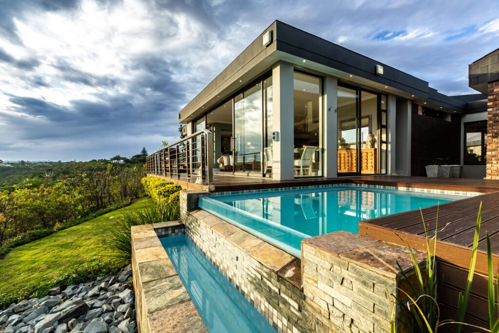 Beautiful image of the exterior of a property with a vibrant cloudy sky in the backdrop